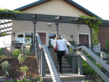 Carolyn ascends the steps to the new tasting room