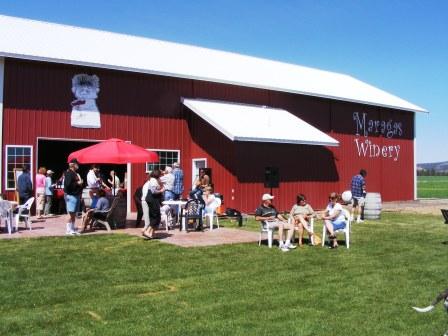 Visitors enjoying the wine, music and weather at Maragas