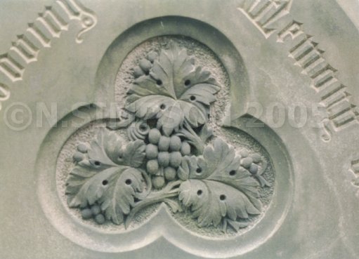 carved grapes headstone