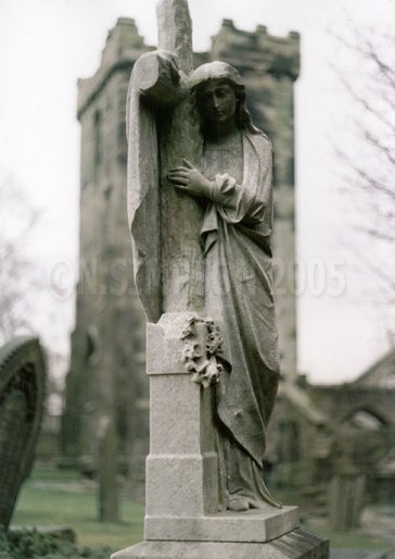 woman holding cross