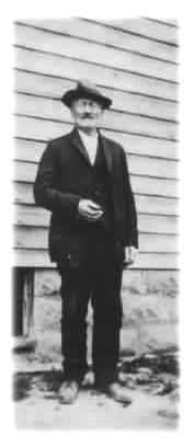 Stefano and his house, 
image courtesy Pat and Alan Navone