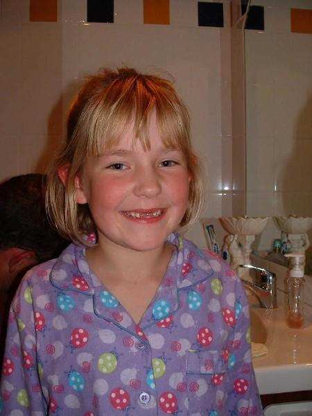 Caitlin missing 2 front teeth