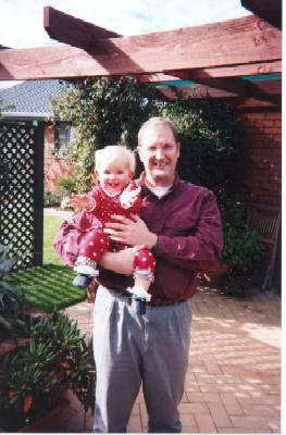Caitlin with Uncle Mark, mid-April 1999