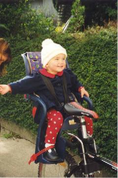 Caitlin in bike-seat