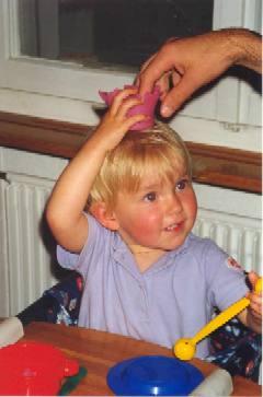 Caitlin with Playdoh hat