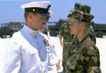I swear thats a smile . . . from GI Jane . . . not quite an Officer and a Gentleman