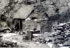 Thomas Lister outside his hut in Arrowtown