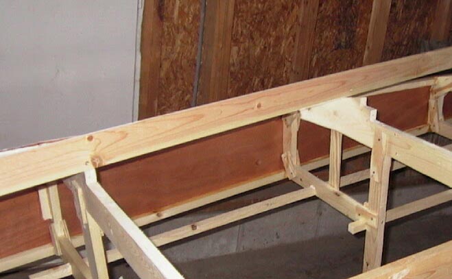 Removing the main stringers to fit the bottom skin