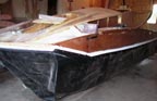 Front skirt being screwed into place