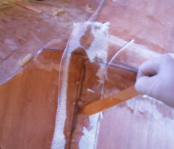 Wetting out the cloth with epoxy