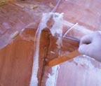 Wetting out the cloth with epoxy