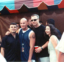 J.V. and Elvis posing with listeners