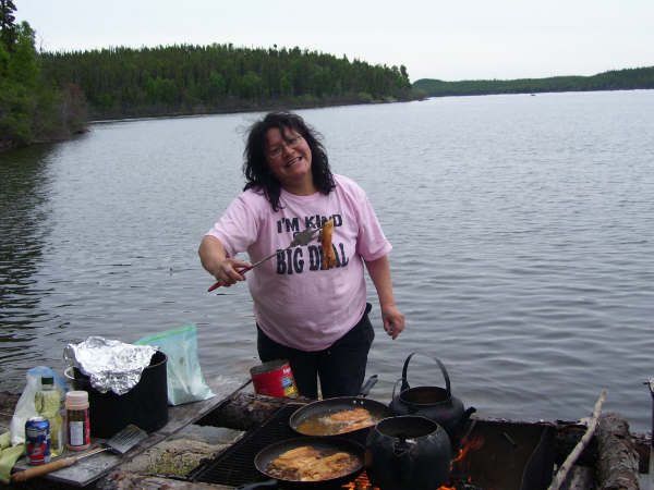 Jackie cooking for the fishermen who entered the derby
