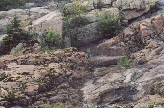Rock by the sand dunes at the shore St Lawrence