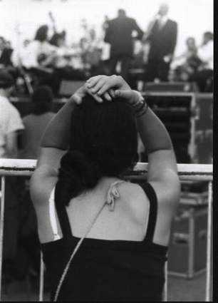 Young girl listening to the Bs. As. Tango Orchestra, Palermo Park
