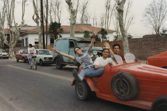 Amused young boys on board of a special car
