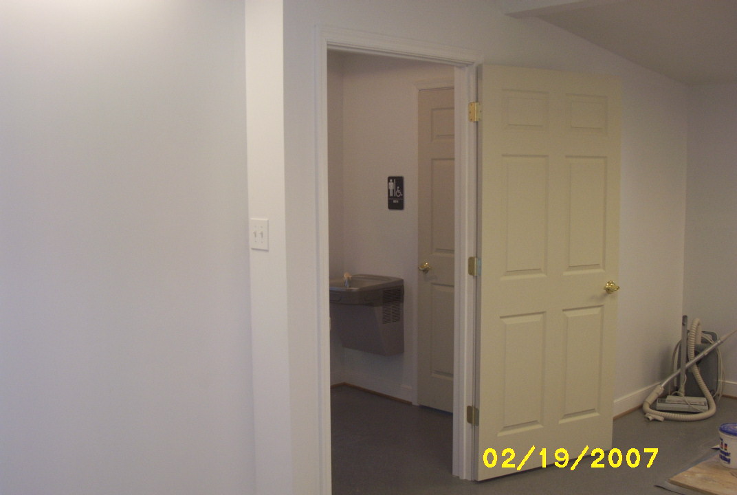 3016-A - Looking from the rear room into the Common Area with restrooms
