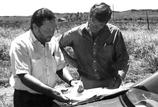 BRUCE ELLISON (Left) with Reporter during 25 anniversary of Shootout at Jumping Bulls, 2000