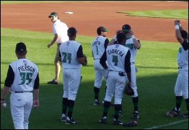 Dayton Dragons players warm up - Photo by Matt Scheurer