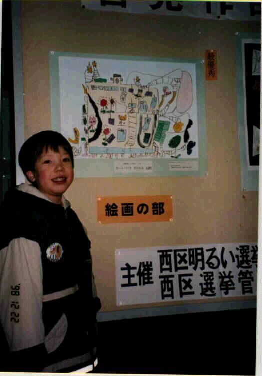 Daniel besides his painting