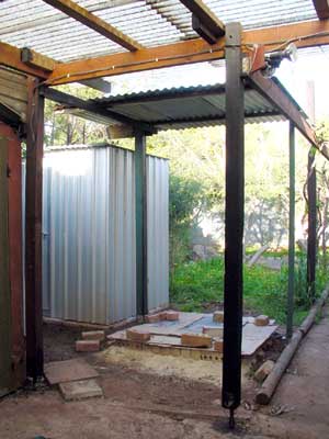 Roof cover over kiln foundation.