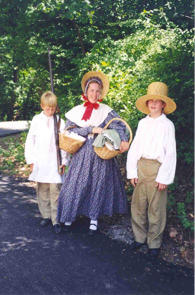 Betsy Urven and sons at 
Lincoln's New Salem, July, 2001.
(Credit: Rusty Ayers.)