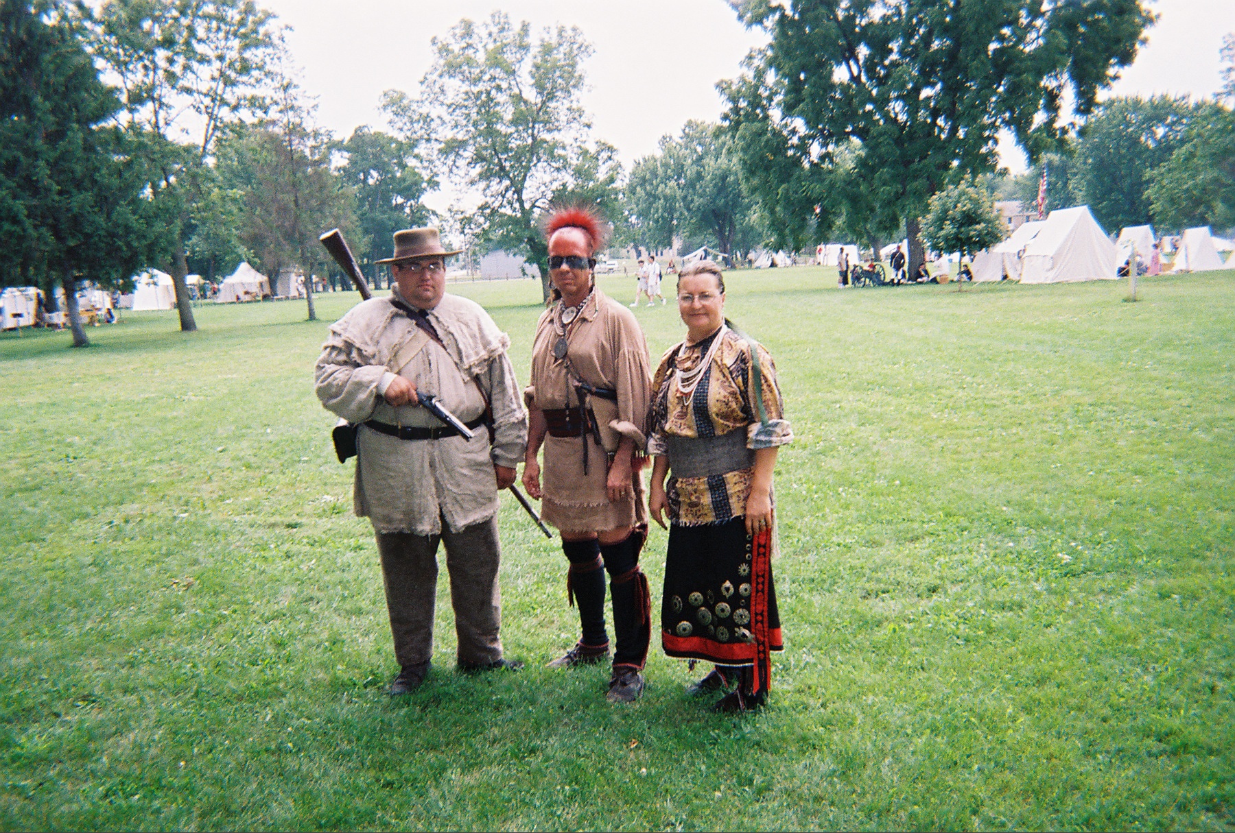 Greg Carter, OLRHS member (left), 
Bob Swanson and Kelly Schott as Sauk warriors. 
Villa Louis State Historic Site, July, 2004.
(Credit: Greg Carter.)