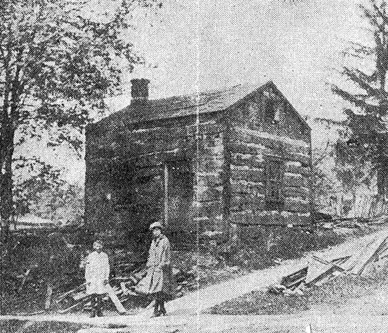 Thomas Parish cabin, circa 1831. 
Originally located at the northwest corner of 
Main and Fountain Streets, Montfort, Wisconsin.
(Credit: Fennimore Times, July 4, 1917.)