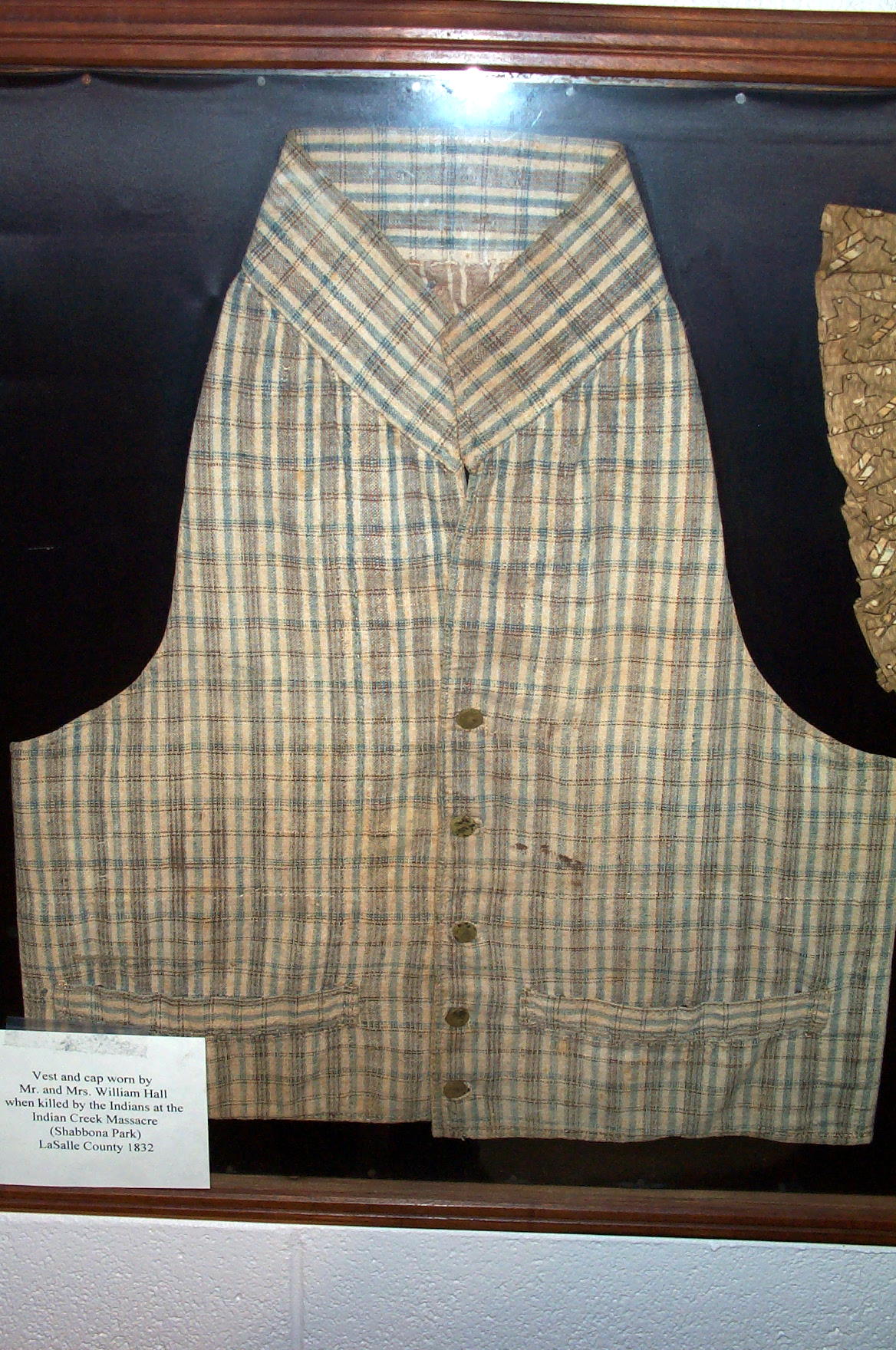 This bloodstained standing collar vest with large welted pockets was worn by William Hall at the time of his death 
during the Indian Creek massacre. (Credit: Jim Patton, 2006)
