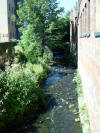 On the other side of the bridge it flows naturally