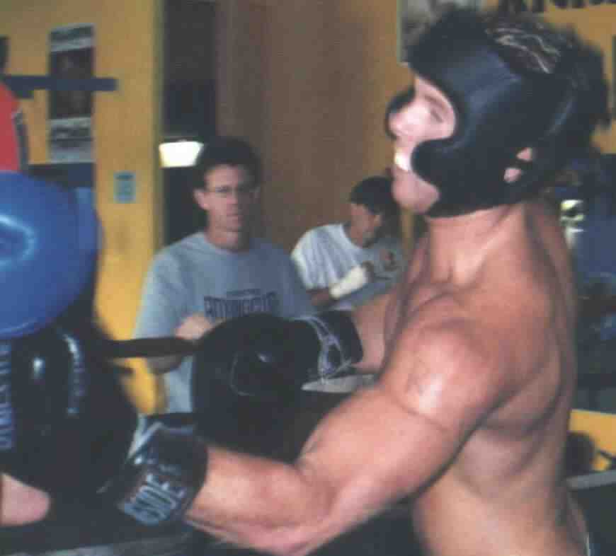 Sparring gives you a chance to practice your combinations and get feedback for improvement.&nbsp; Photogarph copyright 1999.&nbsp; All rights reserved.