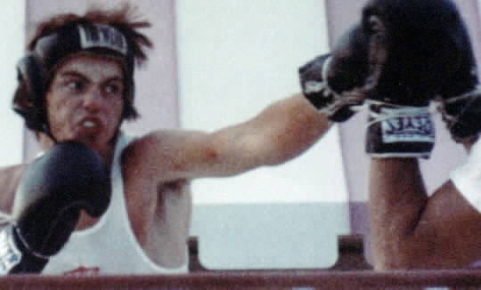 A jab caught. A basic skill learned in jab drill.  Who is that stranger in the photo?  Copyright 2000.  All rights reservd.