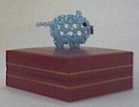Boar in crystal beads sculpture.