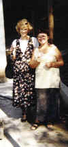 Olga Demidova and Marsha Wallace toast to you at a Greek restaurant