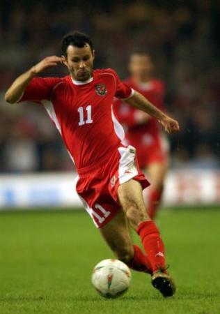 Ryan Giggs In Action For Wales