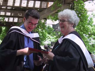 Karl almost walks off the stage without his degree.