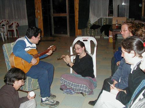 Playing the flute (with Jaime on guitar) at an evening gathering.