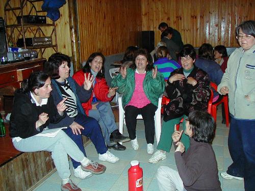 A group of women from Casa Ursulina enjoying themselves at the evening's gathering.  From left to right: Alejandra, Clarina, somebody I don't know, Juanita, Dominga, and In�s.