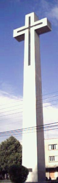 The cross beside the cathedral, 33 meters high to commemorate the deaths of 33,000 people who died in the earthquake of 1939.