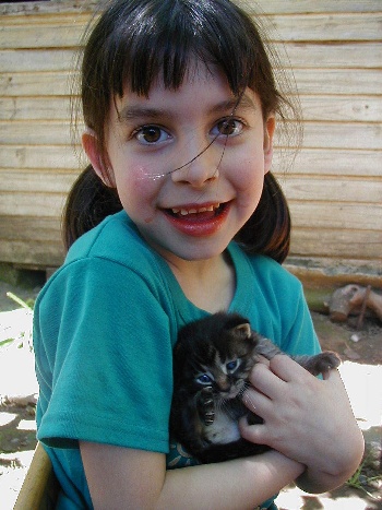 Diana Margarita with one of her new kittens.