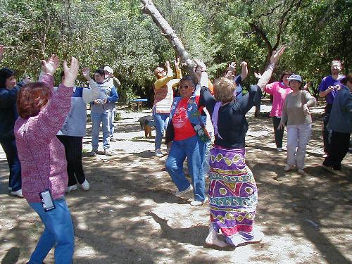 Everyone dancing with Nina.