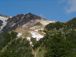 Snowfields and steam vents on the volcano.