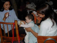 Gabriela enjoying a plateful of cake