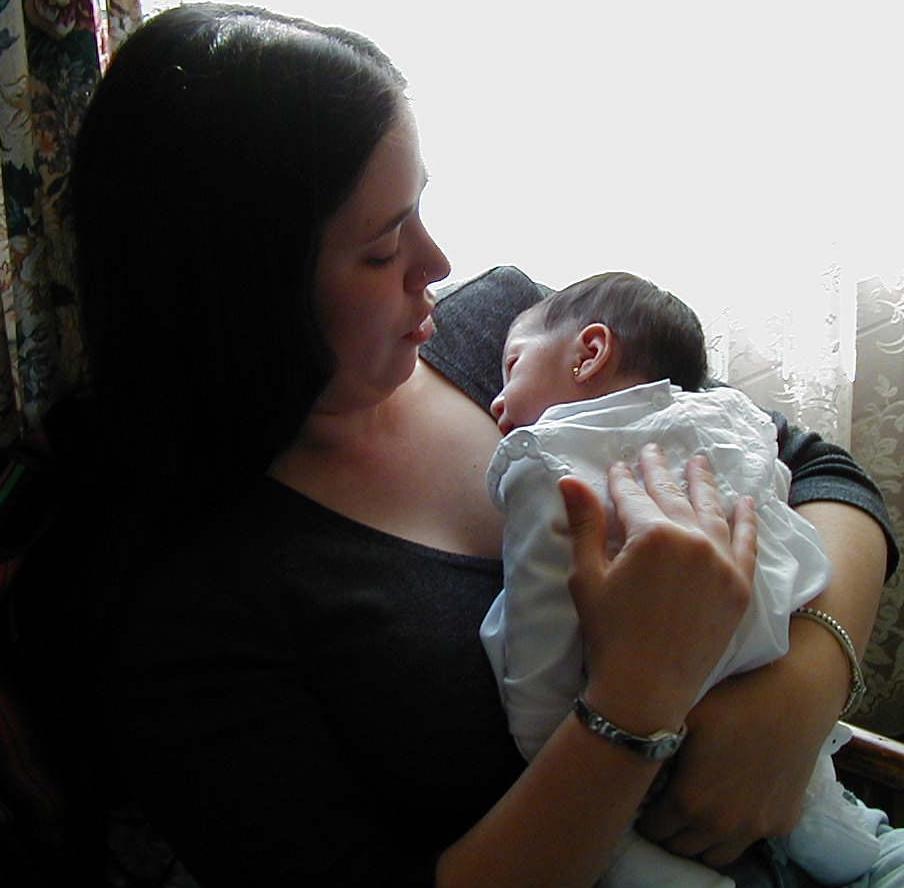 Me with baby Lisette (age 23 days) in the childcare center.
