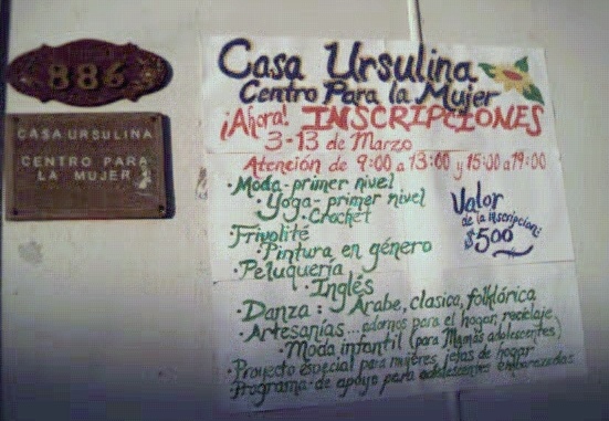 My painted sign advertising the new years' courses at the house. (I'm teaching Yoga, English and Dance.)
