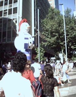 At Midsummer in Santiago, the town Plaza sports a jaunty snowman as an entirely inappropriate Christmas decoration.