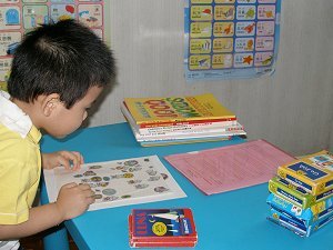 Teaching a kindergarten student at my home.