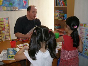 Teaching English to primary school students at my home.