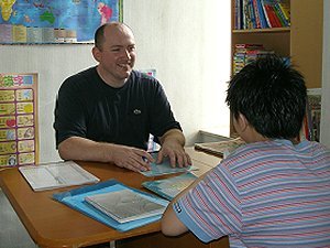 Teaching English to a secondary school student at my home.