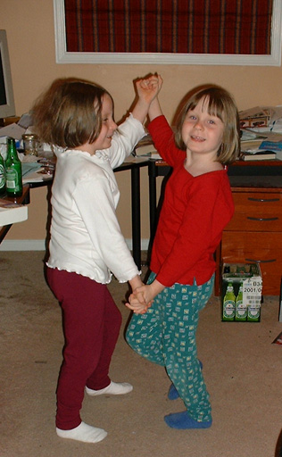 Maddie and Emma "swinging"